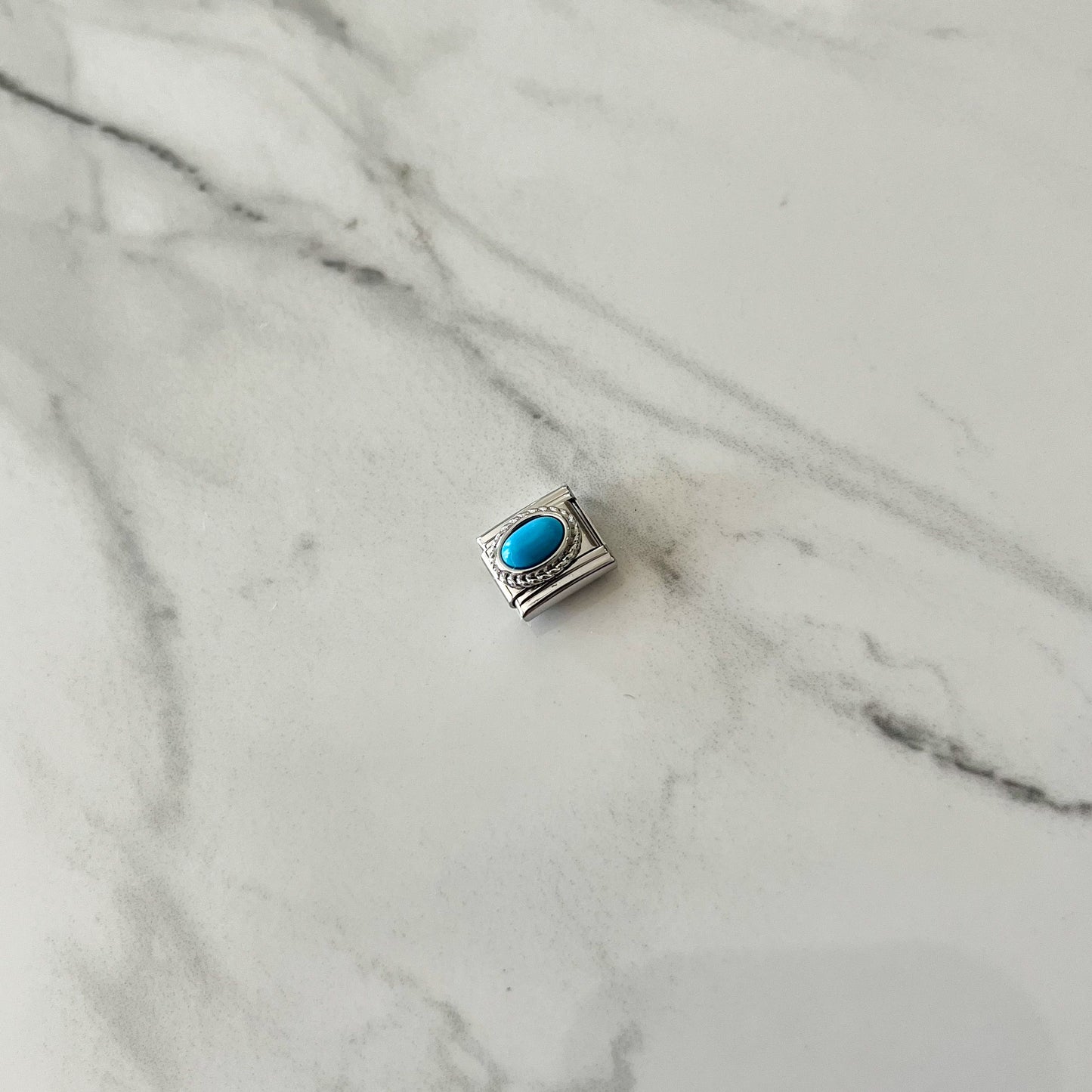 Charm turquesa