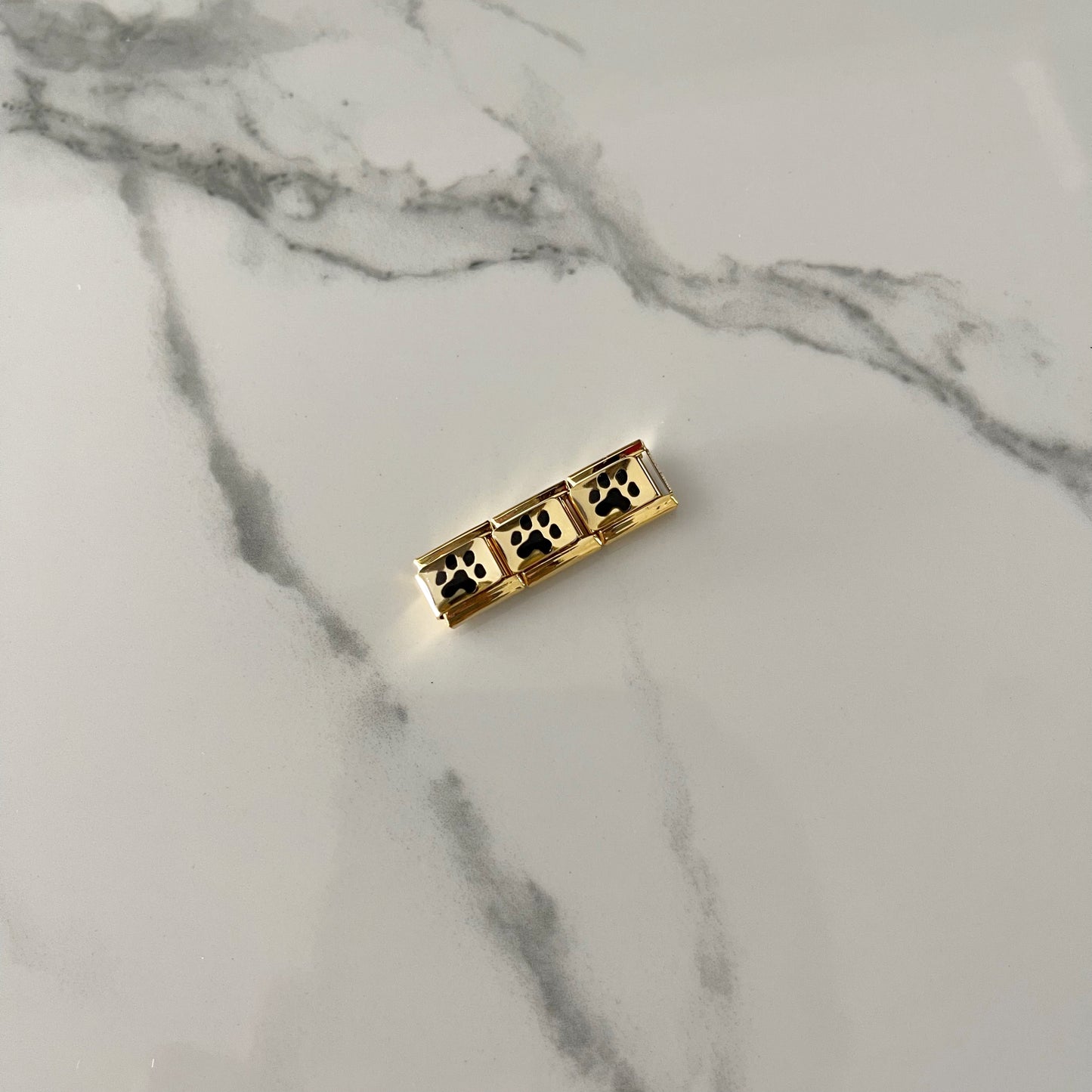 Charm huellita