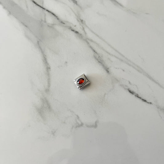 Charm piedra roja